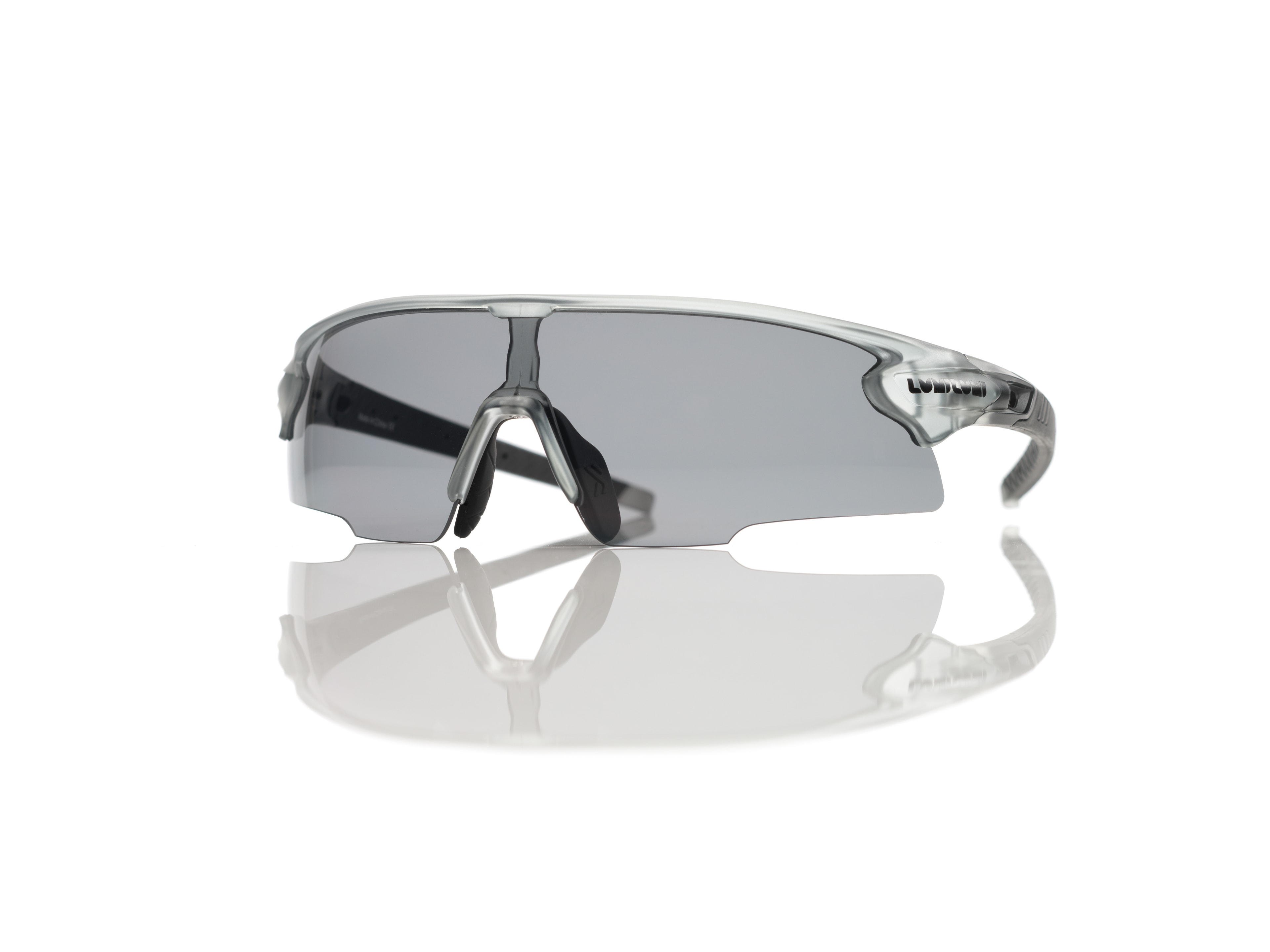 A pair of sports sunglasses with a translucent grey frame.